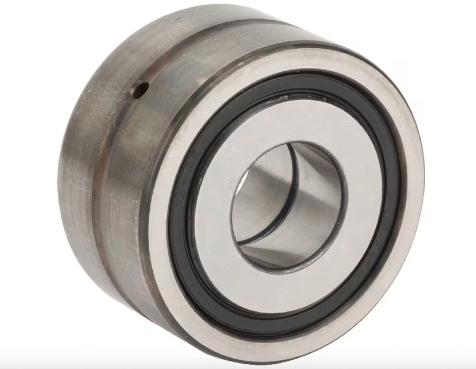 Two Tractors Are Parked in A Grassy Field — Thompson's Farm Gear In Coffs Harbour, NSW