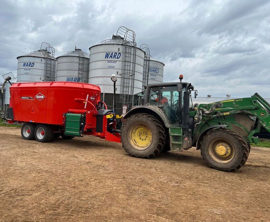 Robust Tractor Equipped with Kuhn Mixer — Thompson's Farm Gear In Wauchope, NSW