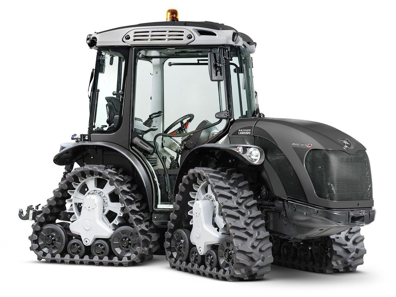 A Black Tractor with White Tracks on A White Background — Thompson's Farm Gear In Wauchope, NSW