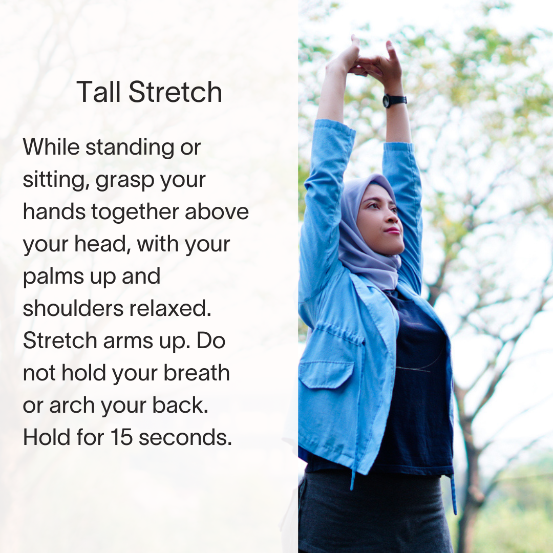 A woman in a blue jacket is doing a tall stretch