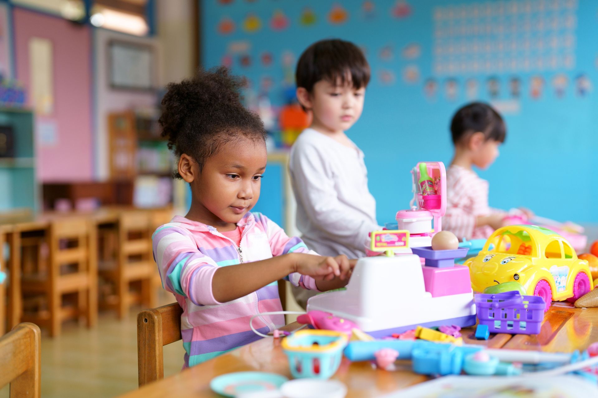 Children playing together in playroom.
