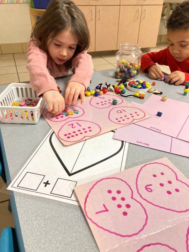 Preschoolers Playing Inside A Room — Canton, MI — Beginners Inn Childcare & Learning Center
