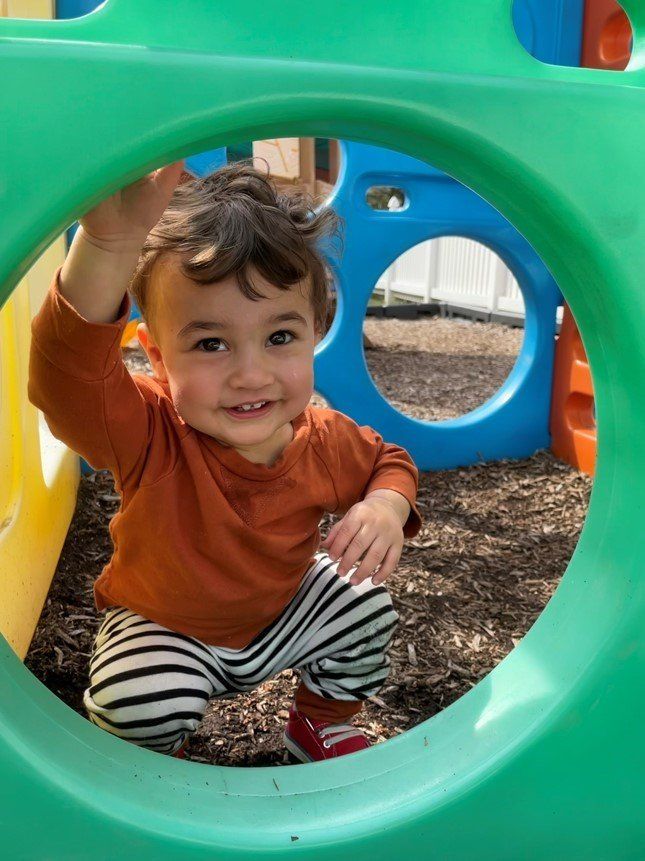 Smiling Toddler — Canton, MI — Beginners Inn Childcare & Learning Center