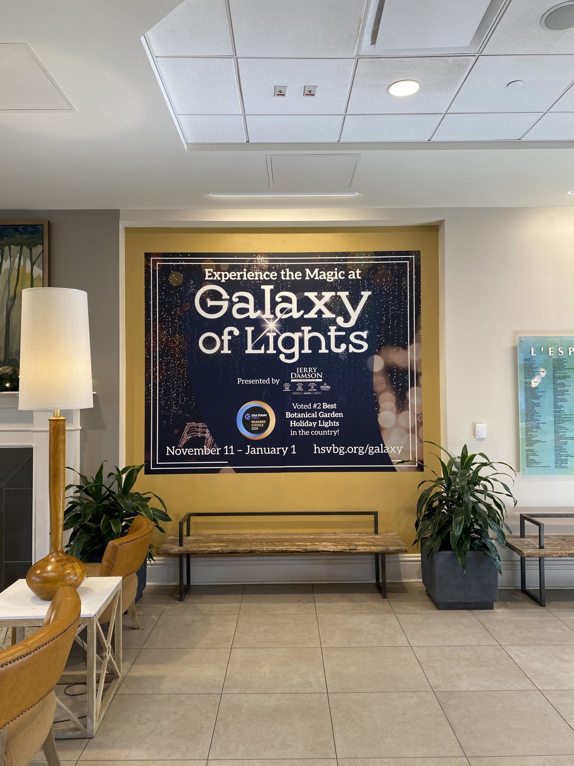 A large poster on a wall that says galaxy of lights