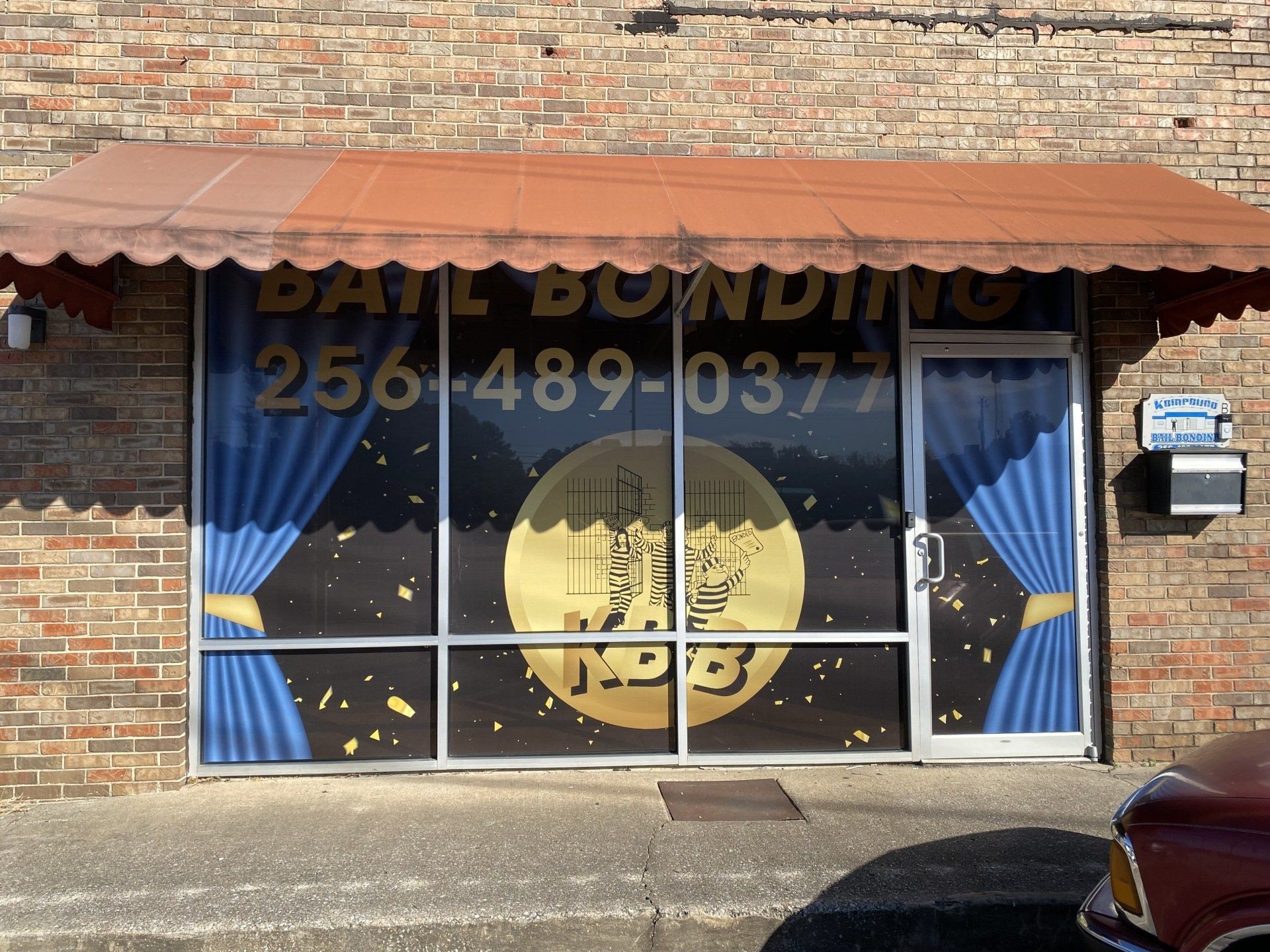 A brick building with a sign that says date bonding