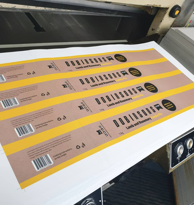 A Bunch of Labels Are Being Printed on a Machine — Brindabella Print In Canberra, ACT