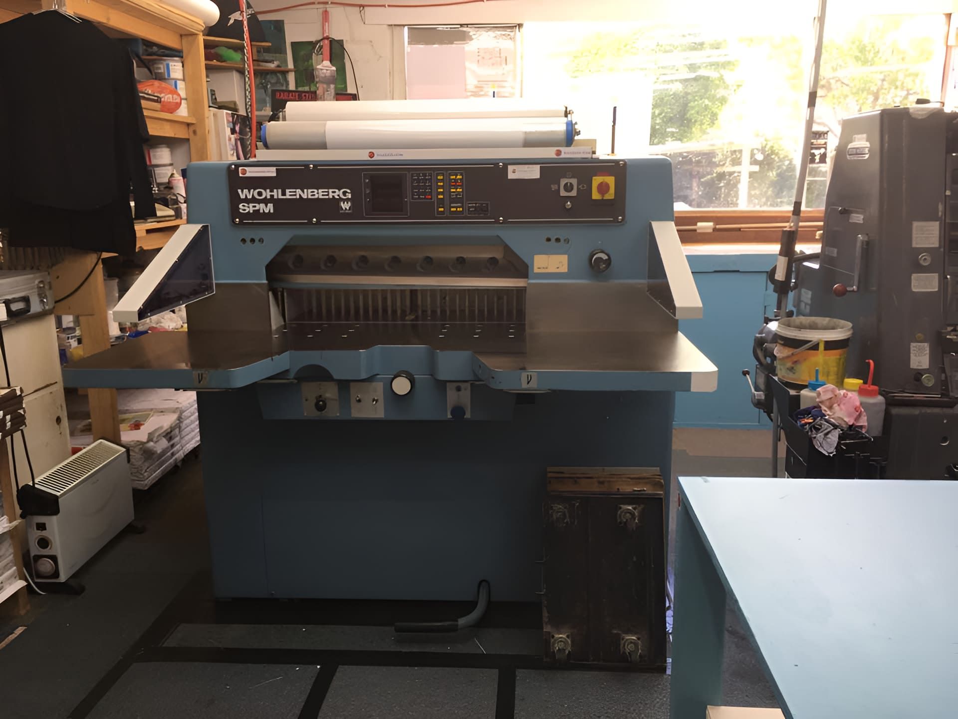 A Blue Machine is Sitting in a Room Next to a Window — Brindabella Print In Pearce, ACT