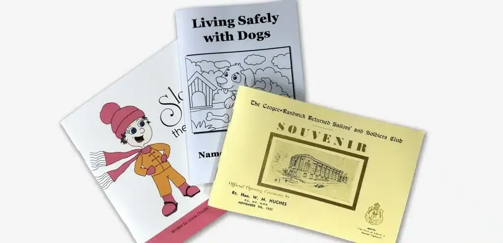 A Book Titled Living Safety With Drugs and a Book Titled Souvenir — Brindabella Print In Pearce, ACT