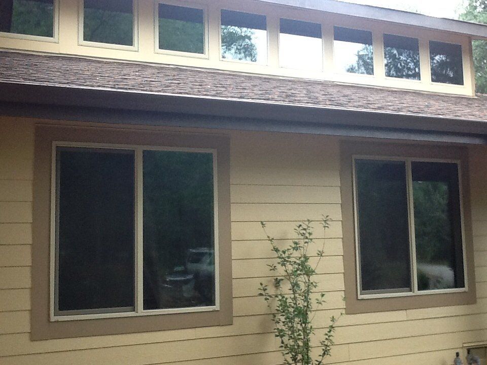 a house with a lot of windows on it.