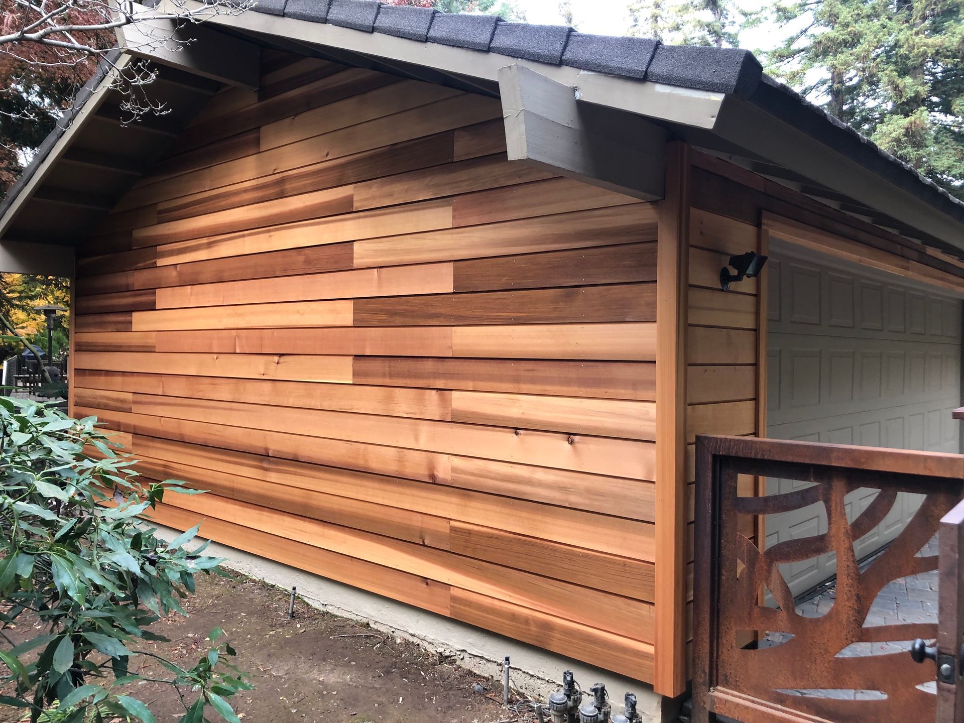 a house with a wooden siding on the side of it.