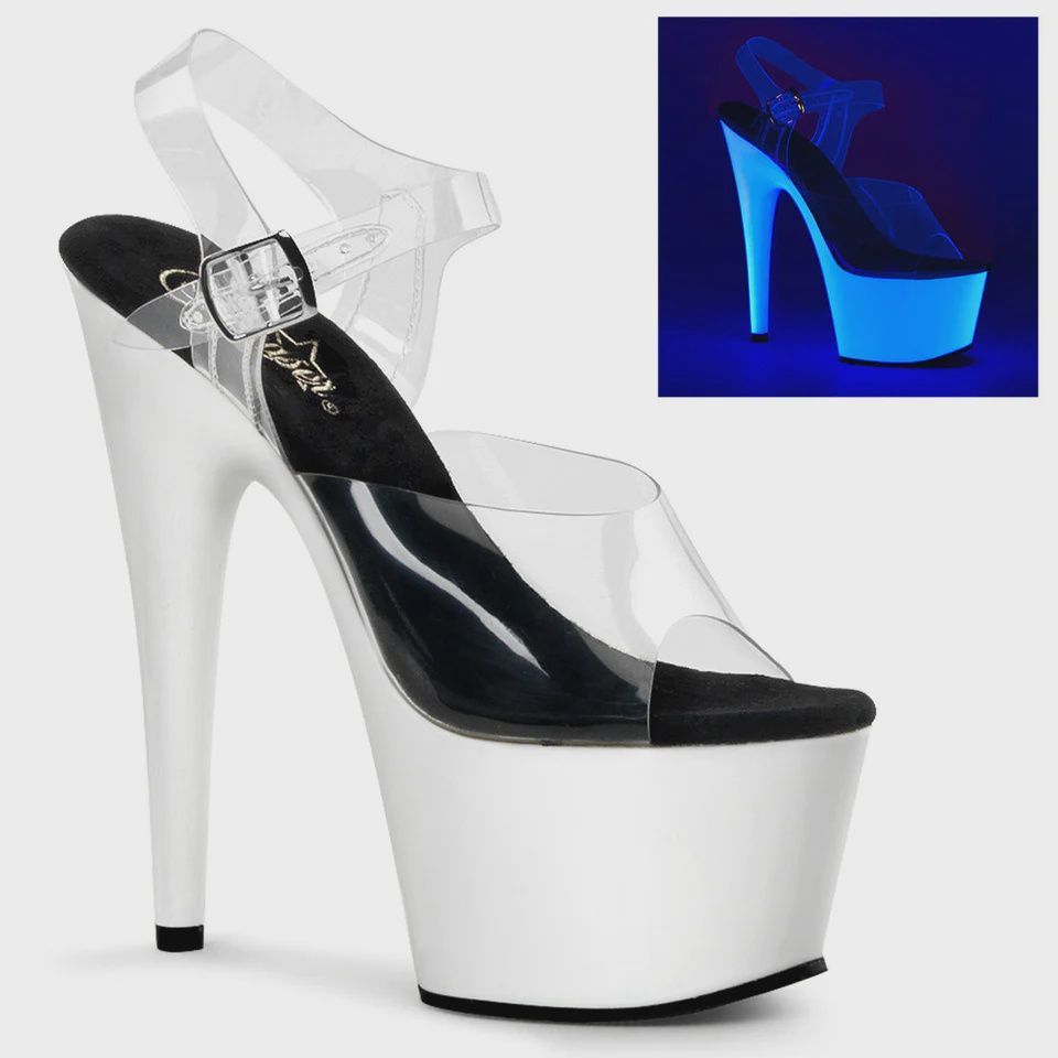 White platform sandal with a clear strap and a black sole, with an inset of the shoe glowing blue under UV light.