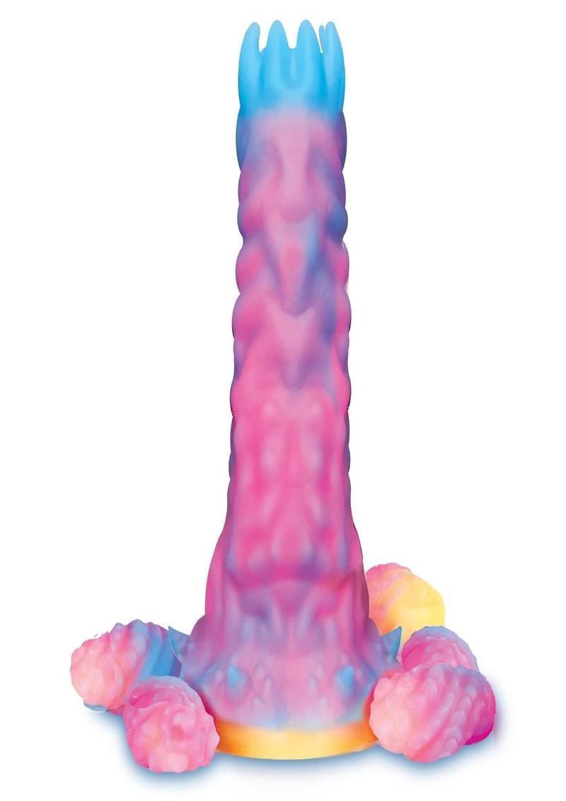 Pink-and-blue ribbed toy figure with a tall cylindrical body and rounded feet on a white background