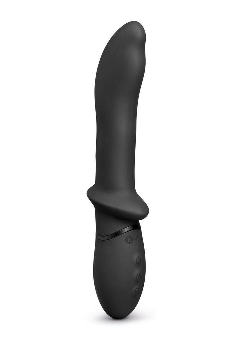 A smooth, black, ergonomic silicone personal massager with a curved top and a flared base against a white background.