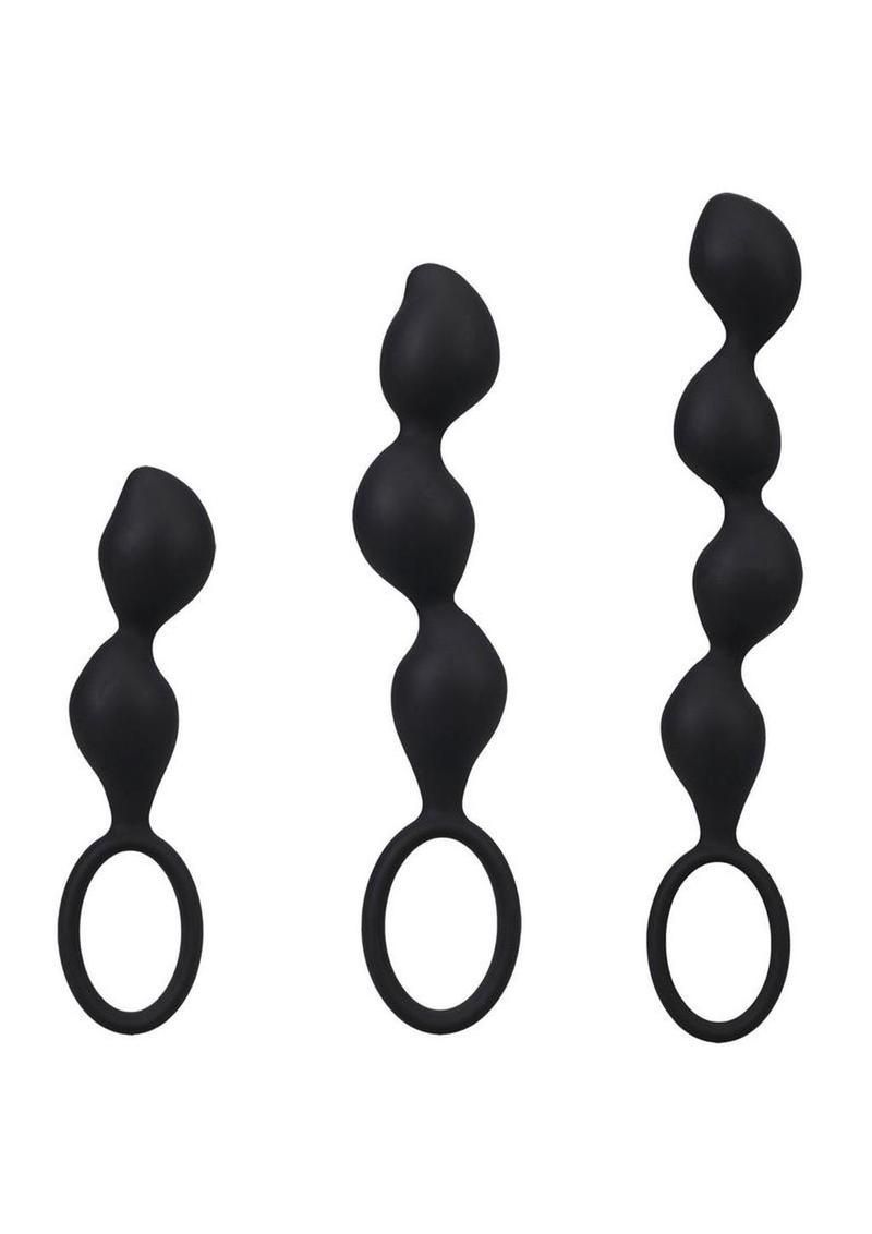 Three black silicone anal beads with loop handles on a white background
