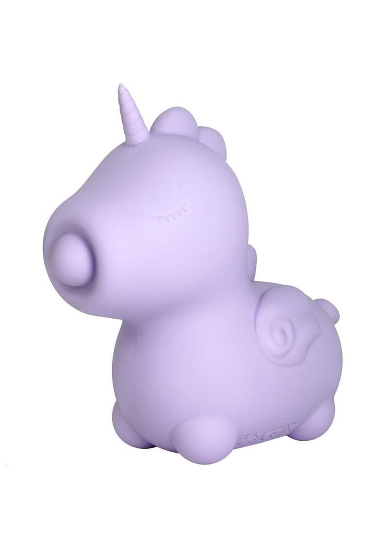 Lavender toy unicorn figurine sex toy with a curled tail on a white background