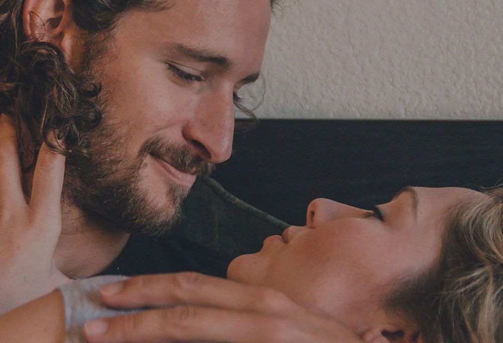 Close up picture of a man and woman embracing