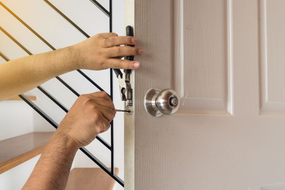 A Red Lock With A Danger Tag Attached To It — Fortress Locksmiths & Security in Hornsby, NSW