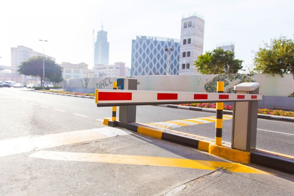 A Barrier Is Blocking The Entrance To A Parking Lot In A City β Fortress Locksmiths & Security in Hornsby, NSW