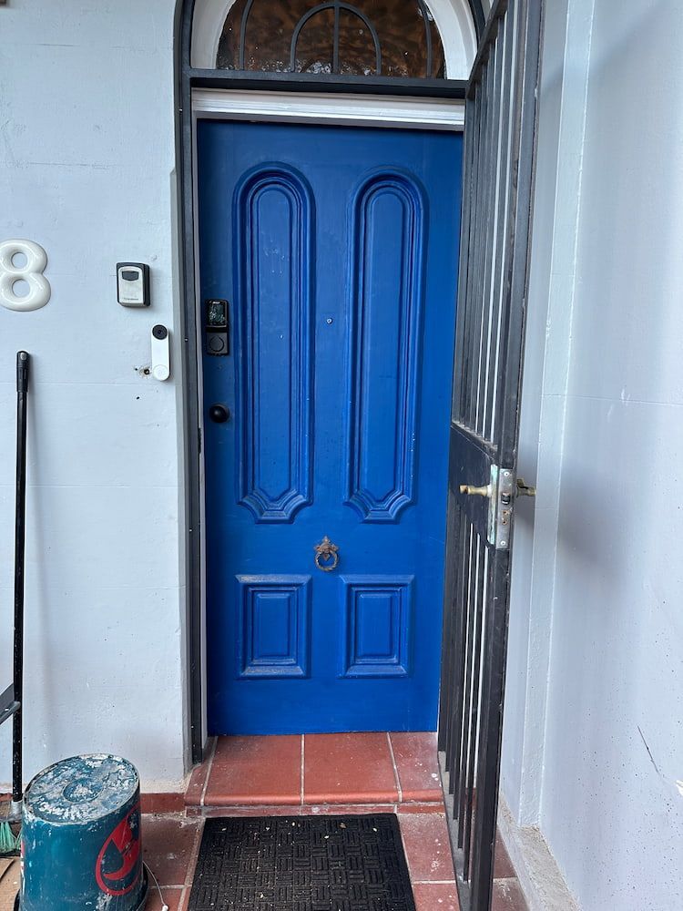 A Blue Door With The Number 8 On It — Fortress Locksmiths & Security in Chatswood, NSW