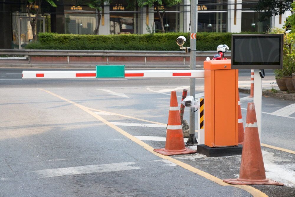 A Parking Lot With A Barrier And Cones On The Side Of The Road β Fortress Locksmiths & Security in Hornsby, NSW
