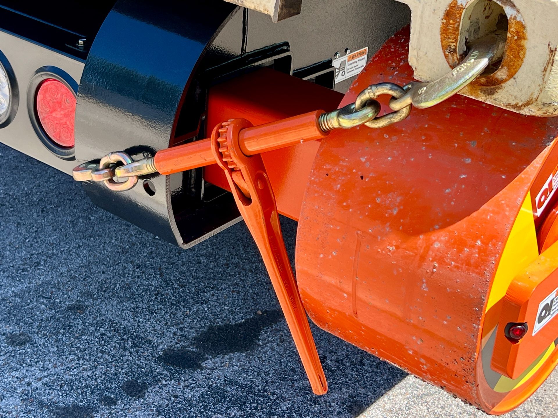 a pair of rachet and hook binders