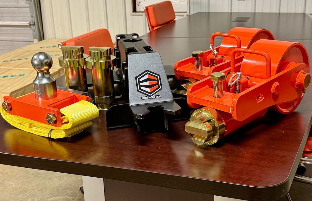 the individual parts of the container relocation kit are displayed sitting on a floor