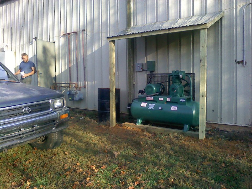 A toyota truck is parked in front of a building