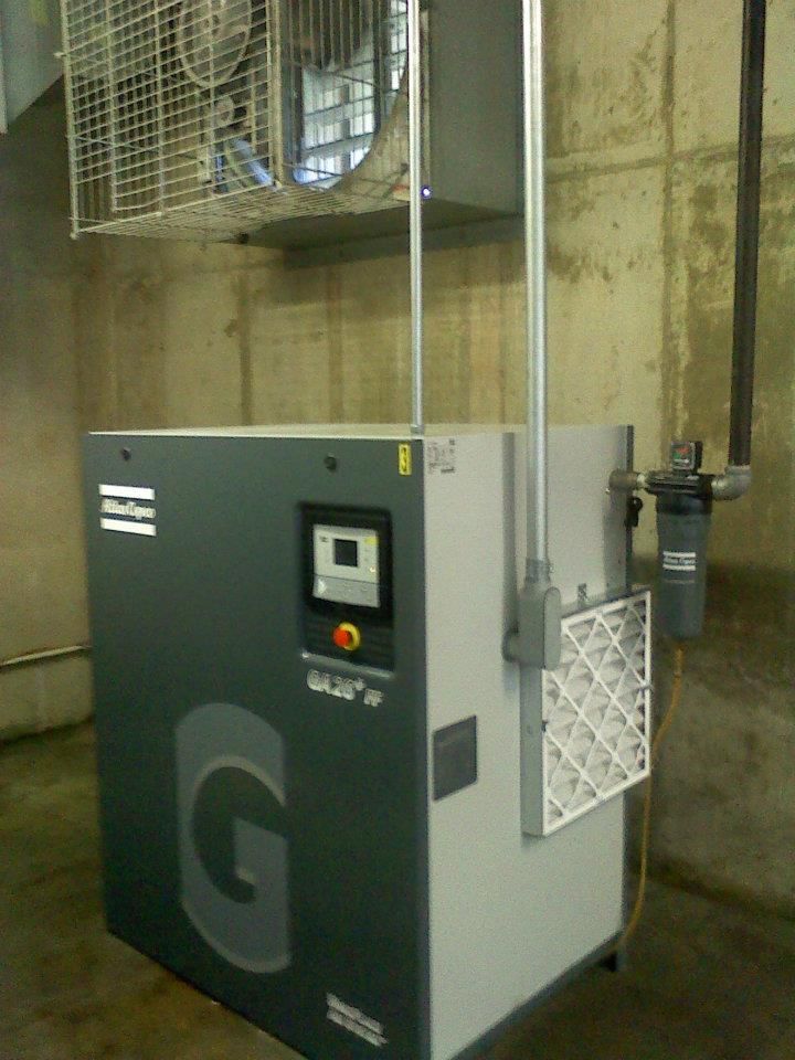 An air compressor with the letter g on it