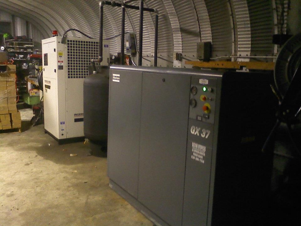 An air compressor with the number 37 on it