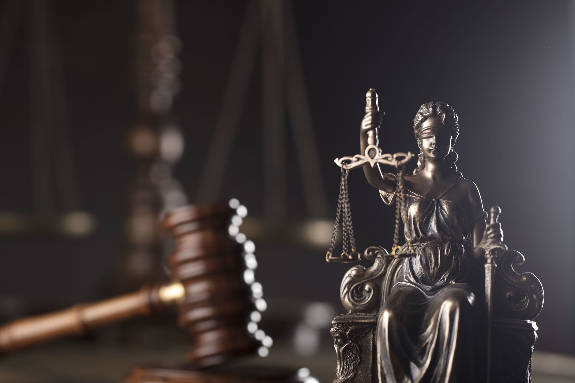 Lady Themis with Gavel — Austin, MN — Hoversten, Johnson, Beckmann & Hovey, LLP