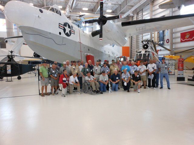 tour group in front of plane