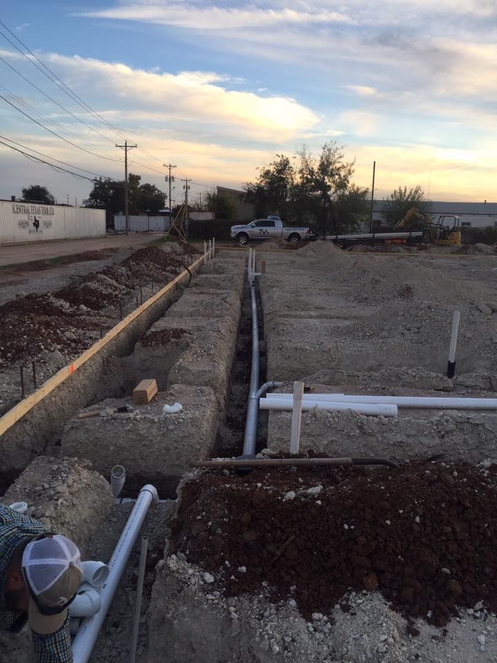 A construction site with a sign that says ' texas ' on it