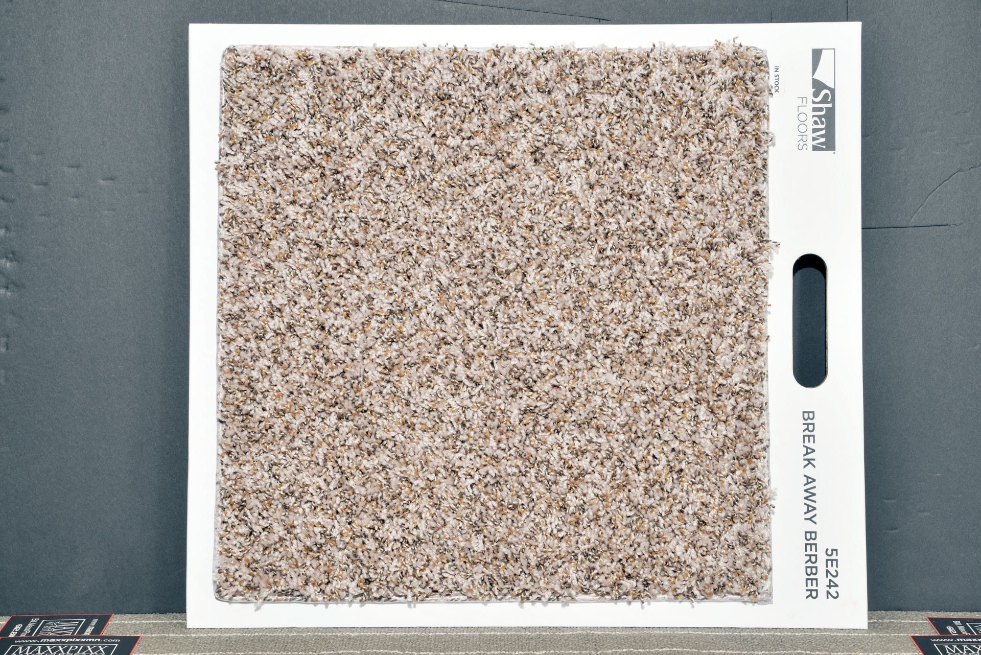 A piece of carpet that says steel matt black on it