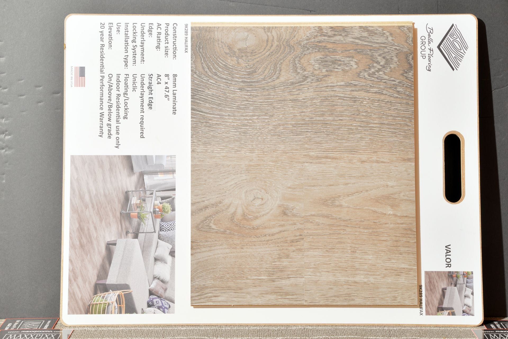 A cutting board with a picture of a living room on it