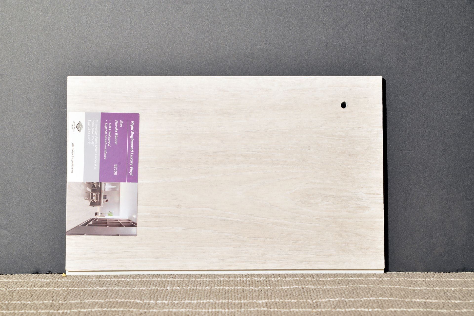 A cutting board with a picture of a kitchen on it