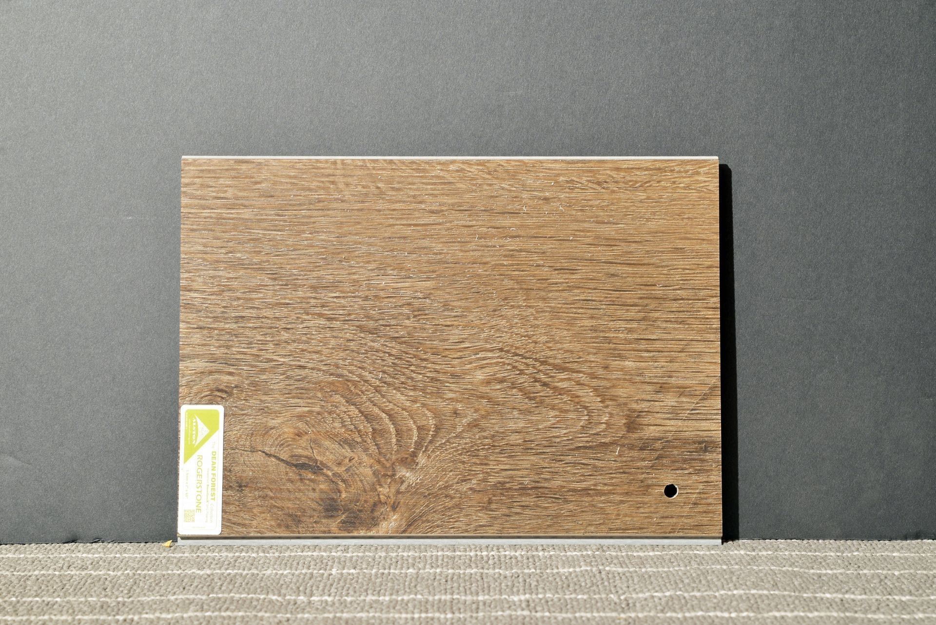 A piece of wood with a label that says ' a ' on it