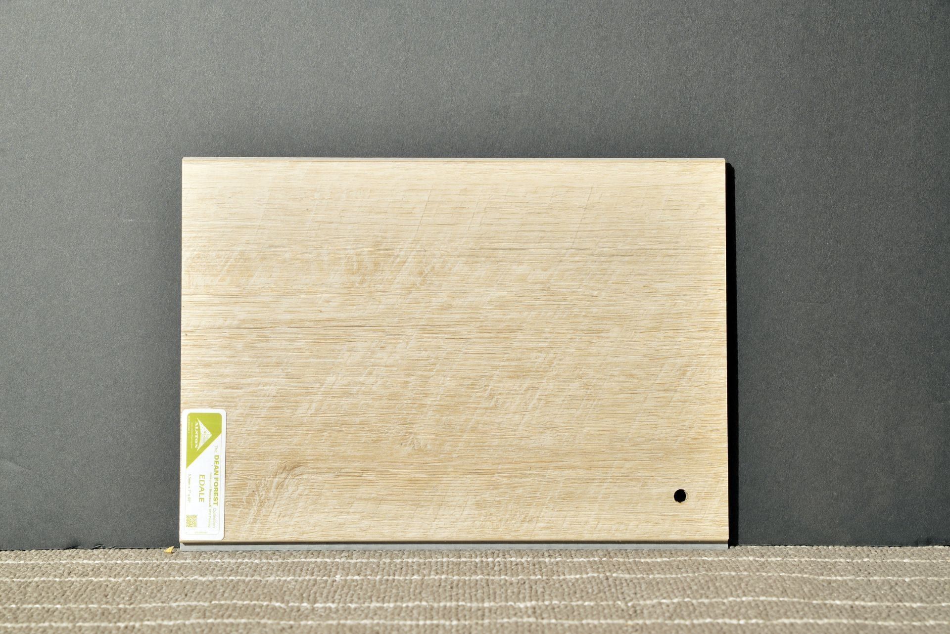 A piece of wood with the letter a on it