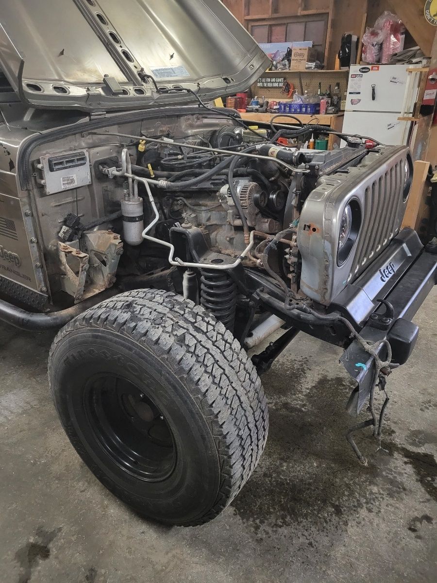 Jeep Front End with Exposed Engine Components | Countryside Automotive