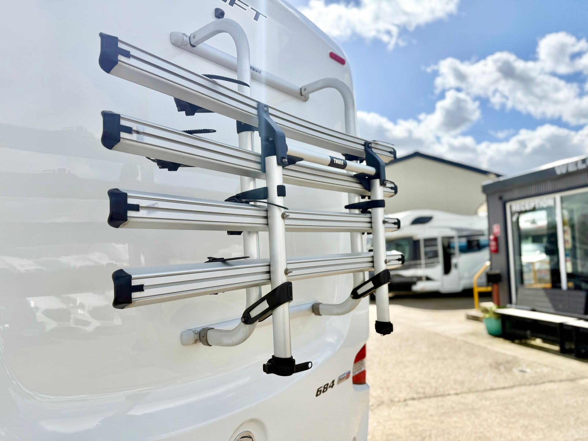 Fiat Ducato Swift Escape 684 motorhome for sale used second with automatic transmission for 4 people 4 berth has two single beds or 2 double beds excellent condition has a bike rack on the rear
