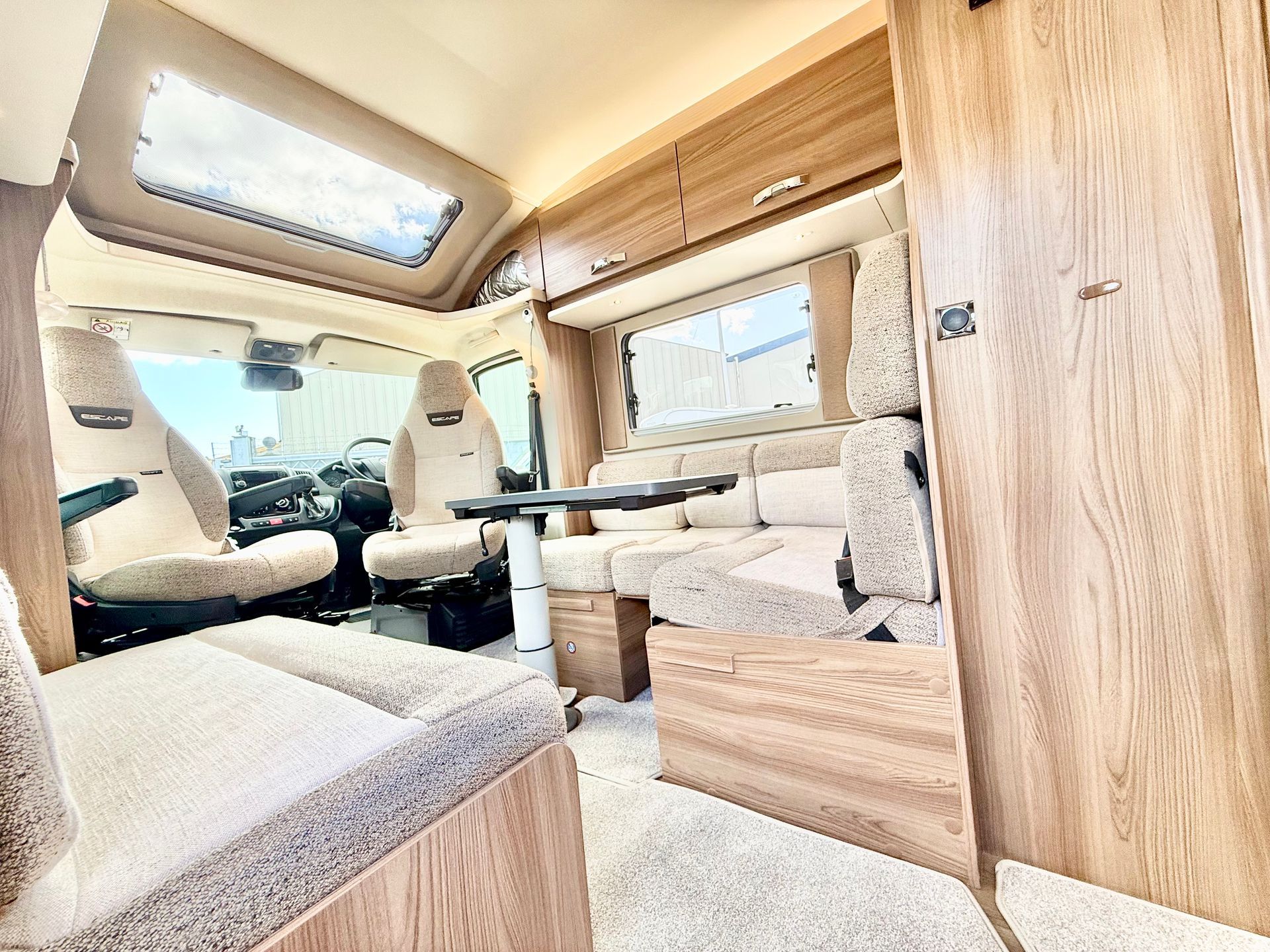 Fiat Ducato Swift Escape 684 - 4 Berth Motorhome For Sale - Automatic Transmission, beautiful dinette area with 4 seat belts
