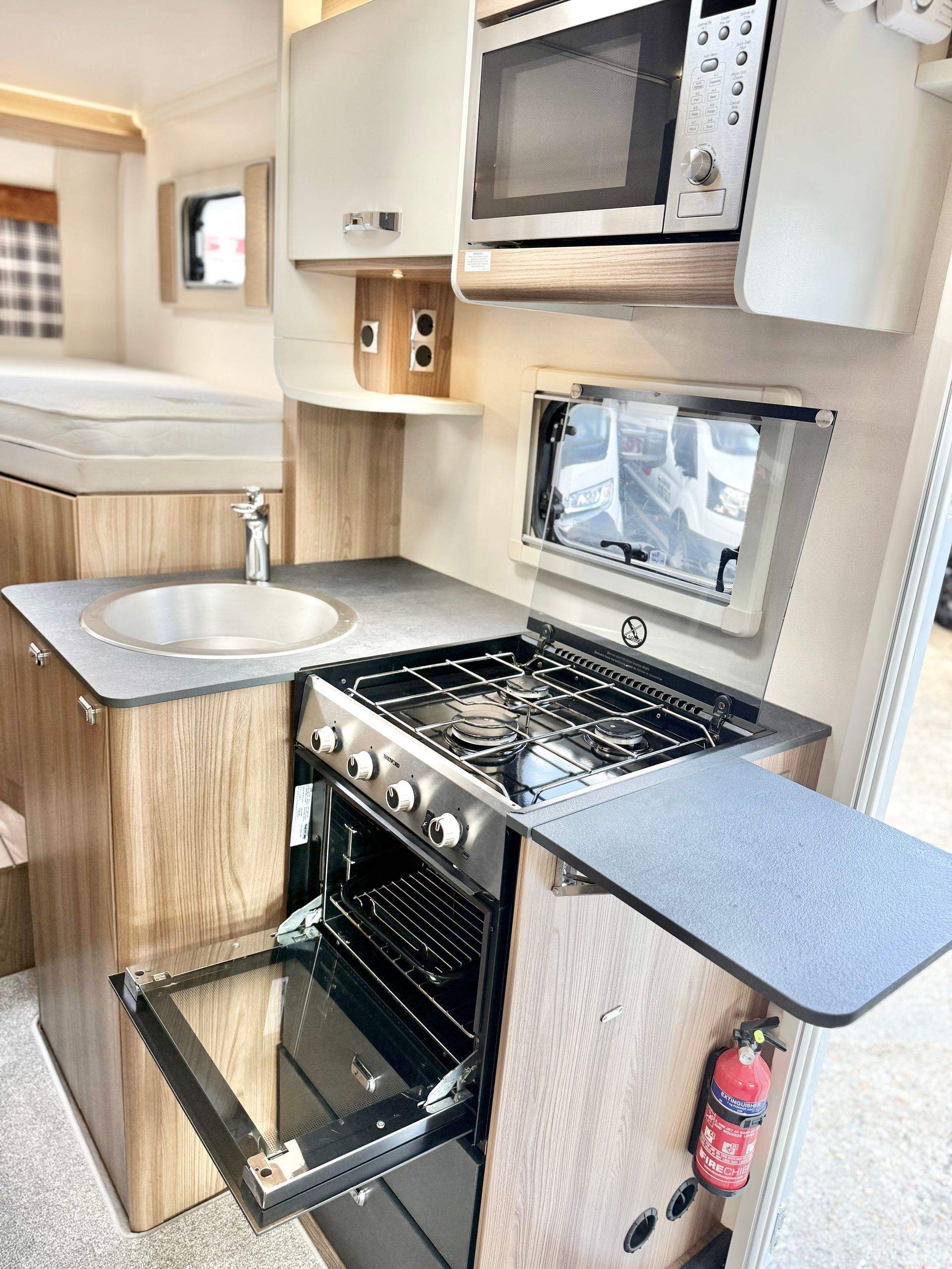 Fiat Ducato Swift Escape 684 - 4 Berth Motorhome For Sale - Automatic Transmission, onboard kitchen with hob, oven, grill, microwave, beautiful kitchen area