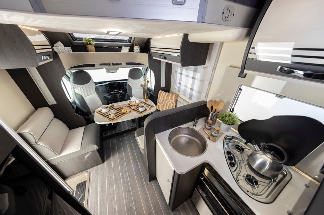 Roller Team Zefiro 685 4 berth motorhome for rental comes with toilet, shower, kitchen, two fixed rear single beds great for holiday, festival, self contained, accommodation, camping, kids holidays, dog friendly,