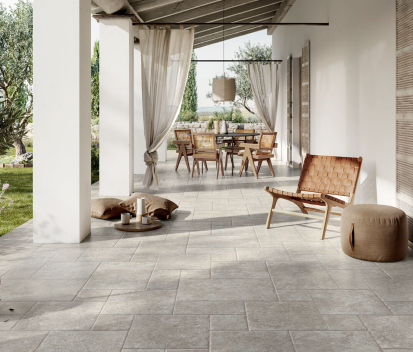 Patio With Tables And Chairs And Grey Tiles — Tile Trends in Tweed Heads South, NSW