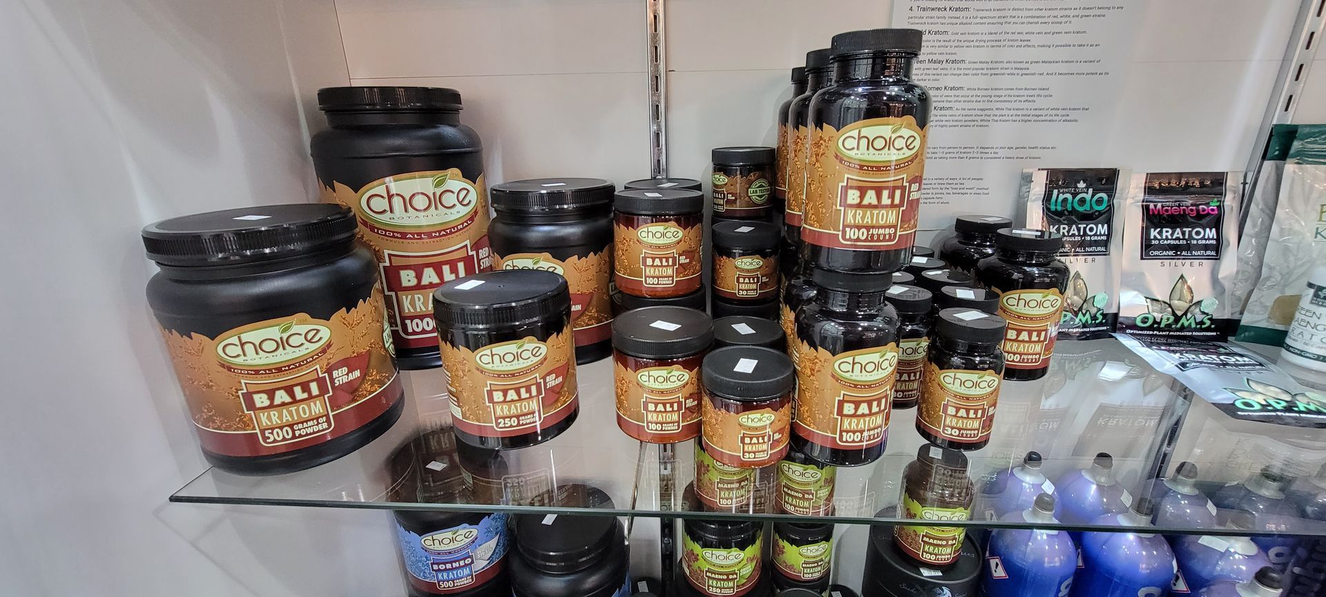 Shelves with many jars of supplements labeled 