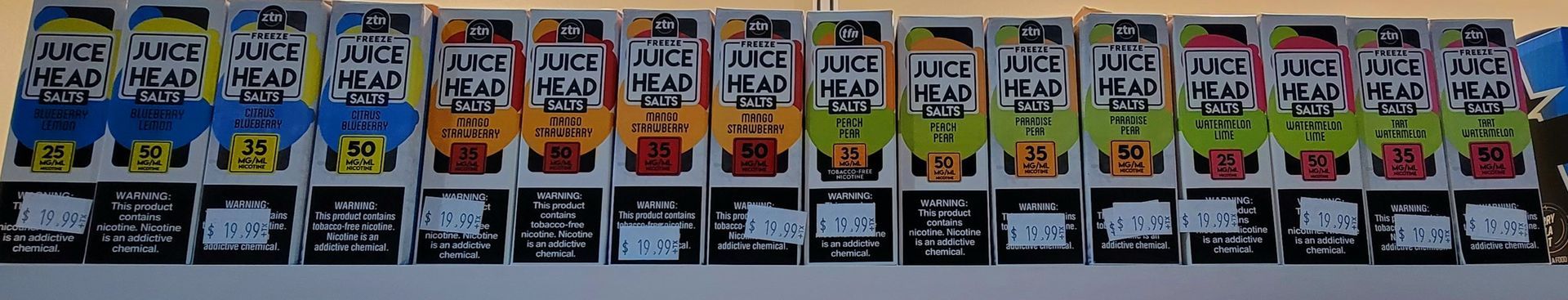 Row of colorful Funko Pop boxes, featuring various characters.