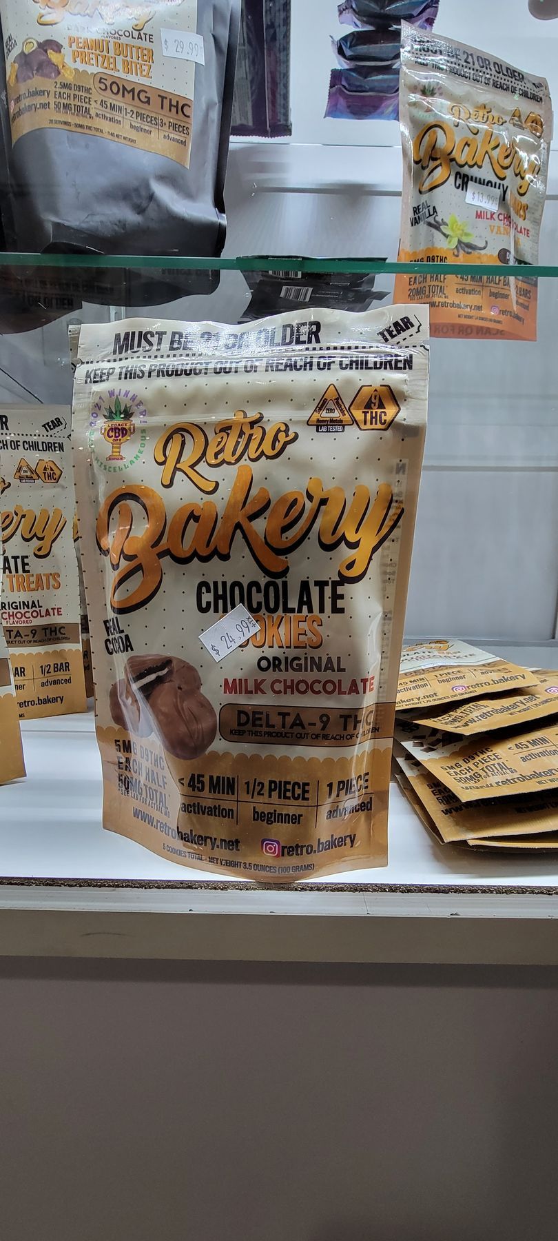 Raw Bakery Chocolate cookies bag. Brown packaging on shelf.