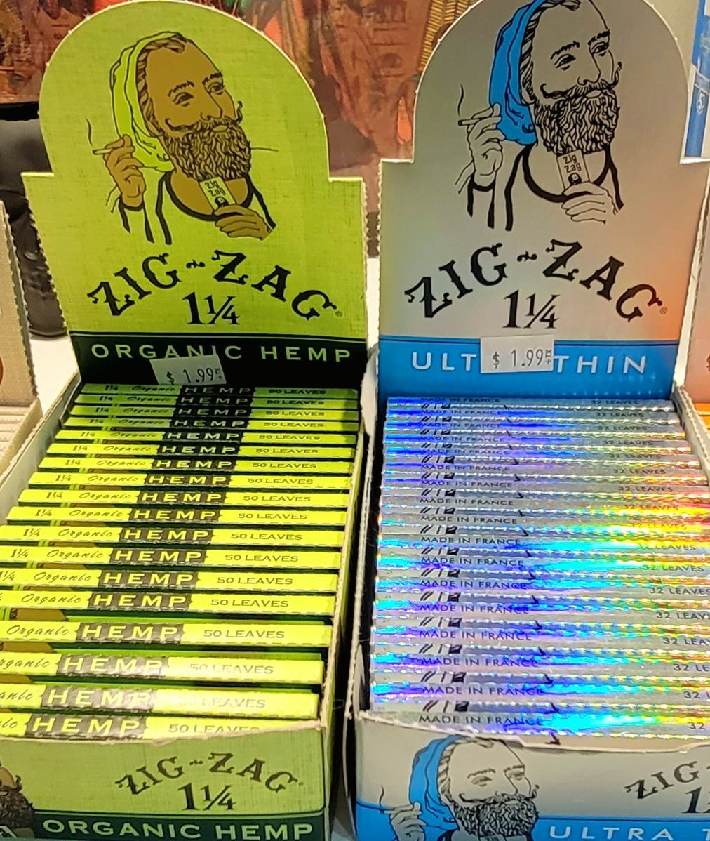 Display of Zig-Zag rolling paper boxes, organic hemp and ultra-slim thin varieties.