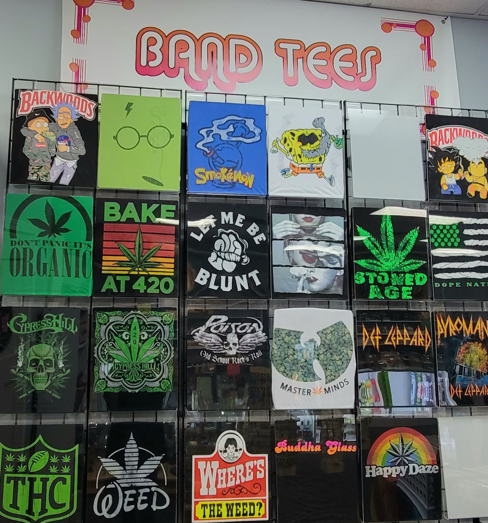 Band tees for sale, including cannabis and pop culture designs.