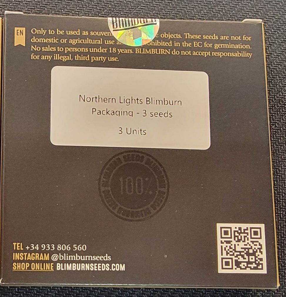 Box of Northern Lights Blimburn cannabis seeds. Contains 5 units, with warnings and contact info.