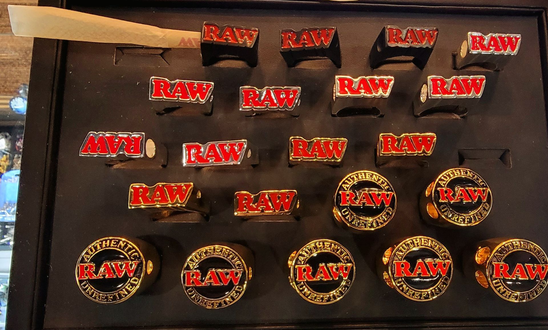 Display case of various gold and red 